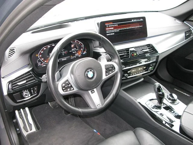 2023 BMW 5 Series M550i xDrive — photo